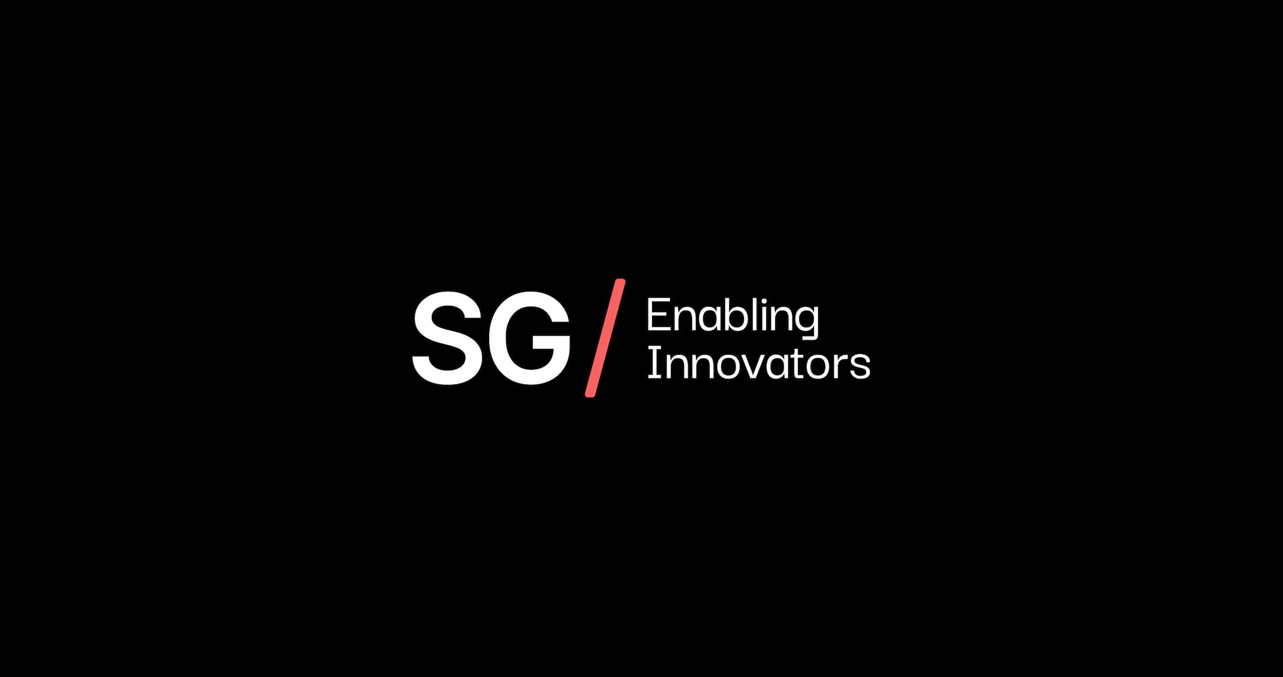 White Logo on black background with coral coloured forward slash between SG and Enabling Innovators. Logo designed by Orangery, a technology marketing agency.